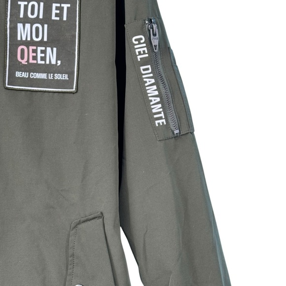 Green Raincoat with Stand-Up Collar and Zipper Closure - Picture 4 of 13